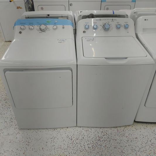 Used GE 4.5 cubic foot top load washer and 7.2 cubic foot electric dryer set